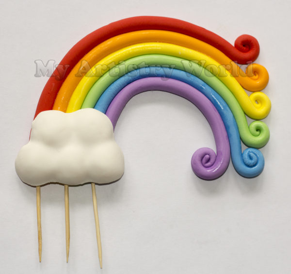 Rainbow with a cloud cake topper