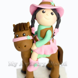 Sheriff Girl on a horse cake topper