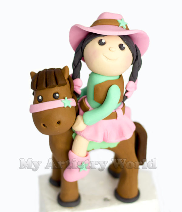 Sheriff Girl on a horse cake topper