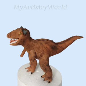 Edible Carnotaurus cake topper