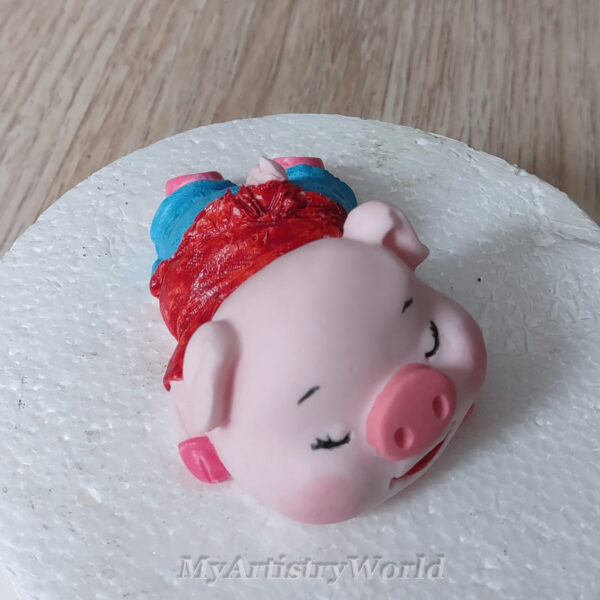 Piglet cake topper