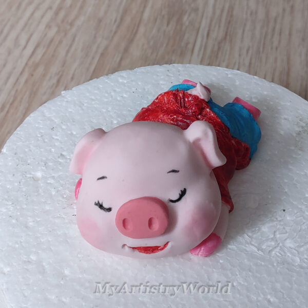 Piglet cake topper