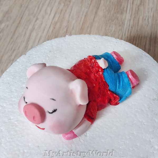 Piglet cake topper