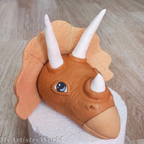 Dinosaur (Triceratops) head cake topper