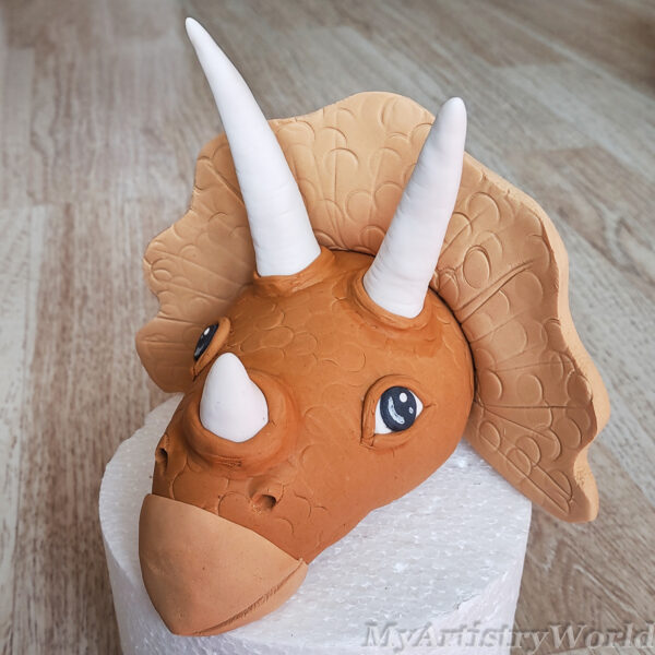 Dinosaur (Triceratops) head cake topper