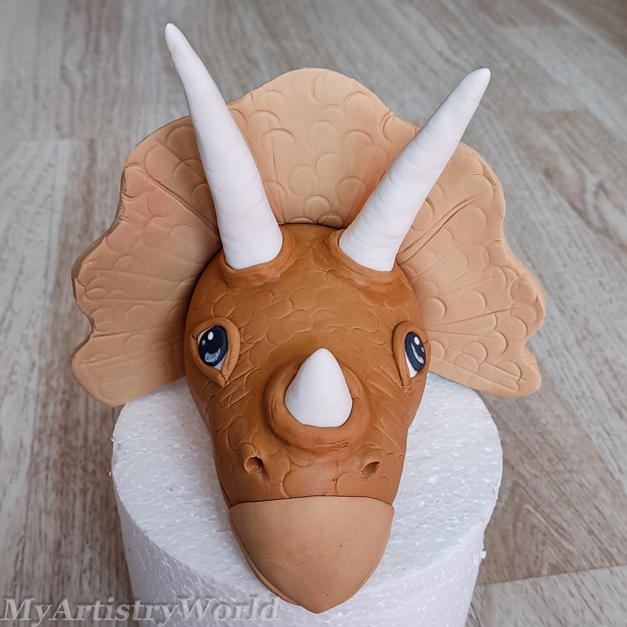 Dinosaur (Triceratops) head cake topper